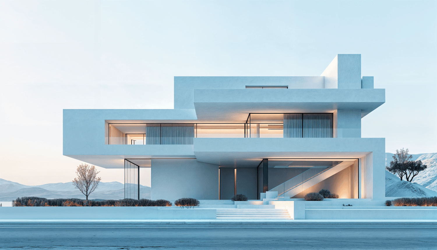 The finished house at dusk, its windows warmly lit