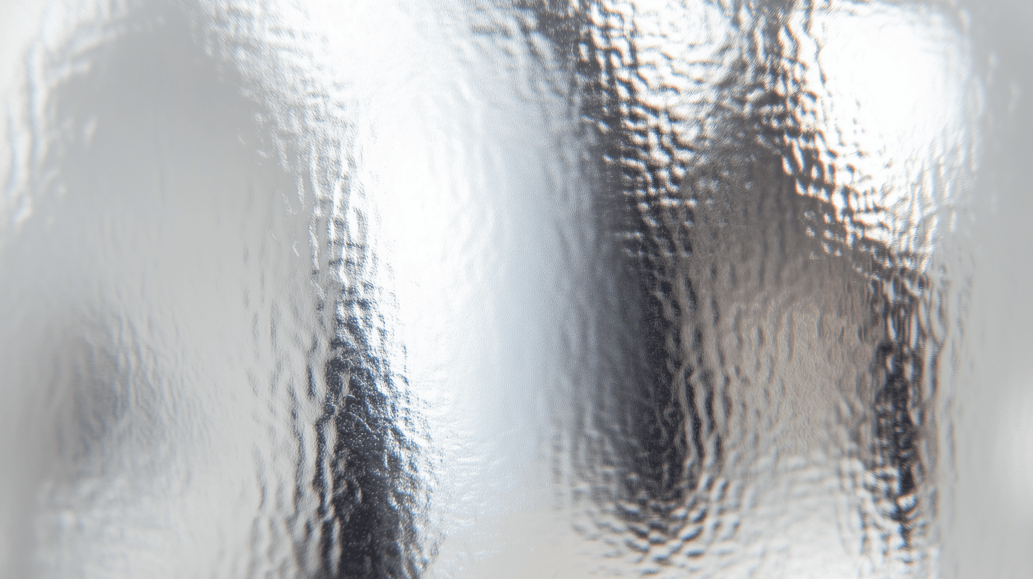 Close-up of glass catching grey light