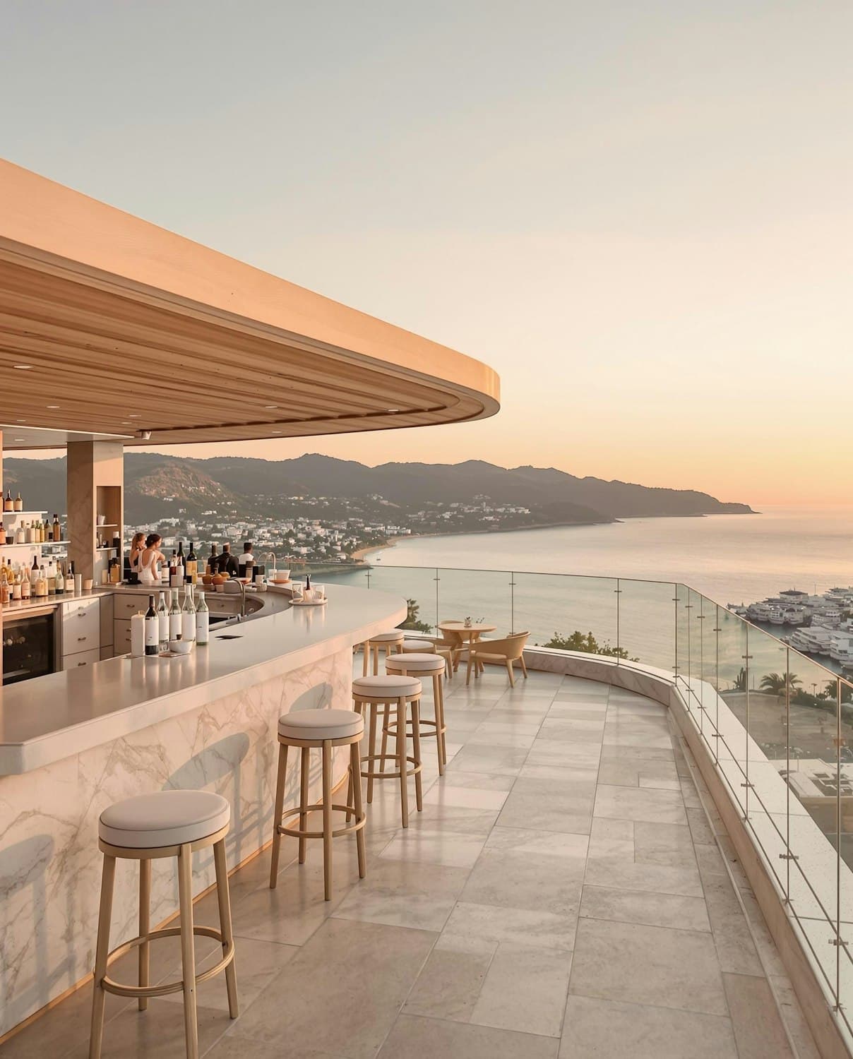 Rooftop bar of North Pier Hotel at sunset, with the Adriatic coast beyond
