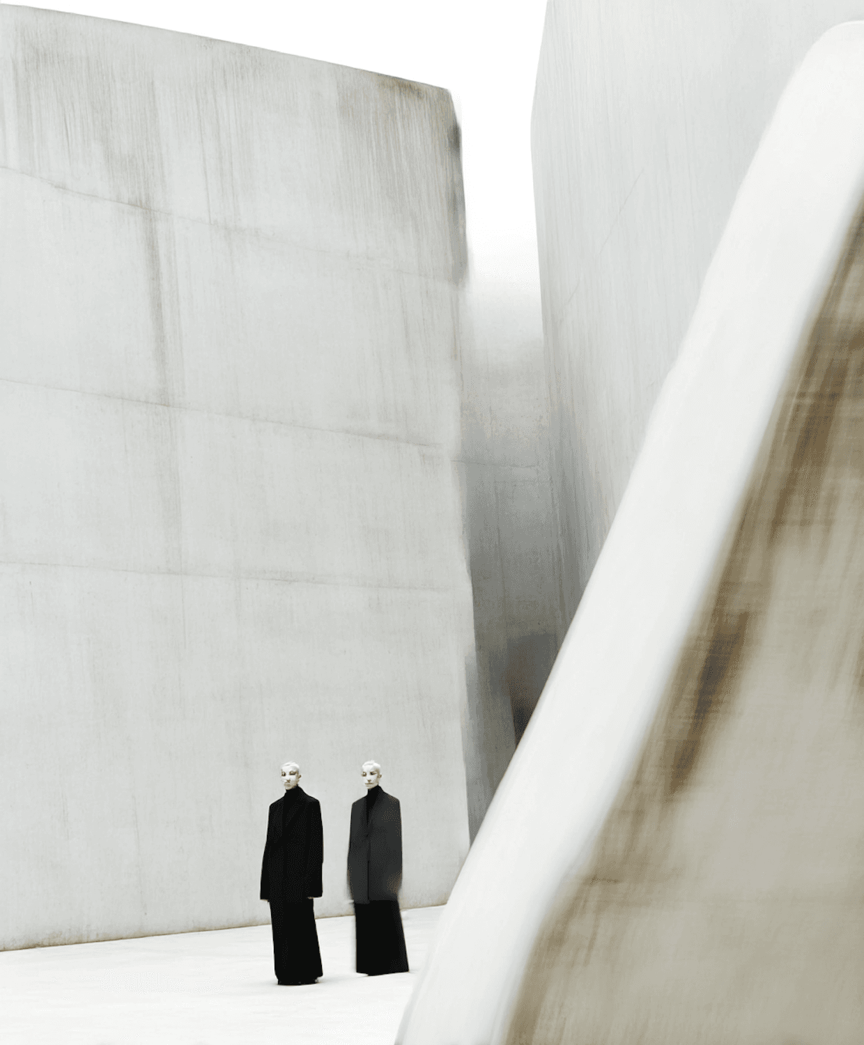 Two members of the Halden & Rue team standing in an unfinished concrete structure